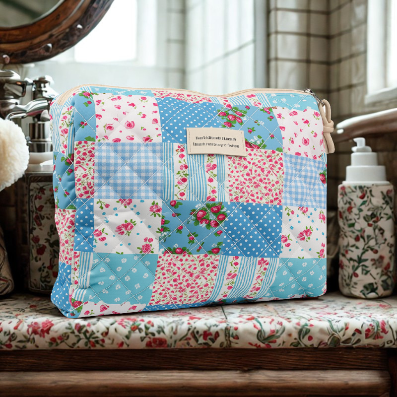 Compact country quilt pouch on rustic wooden vanity