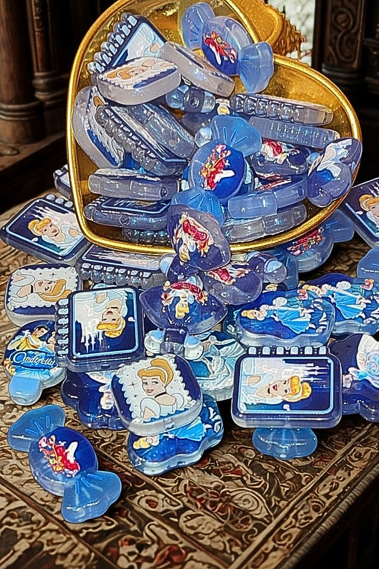 Cinderella beads close up showing blue glitter finish and character details