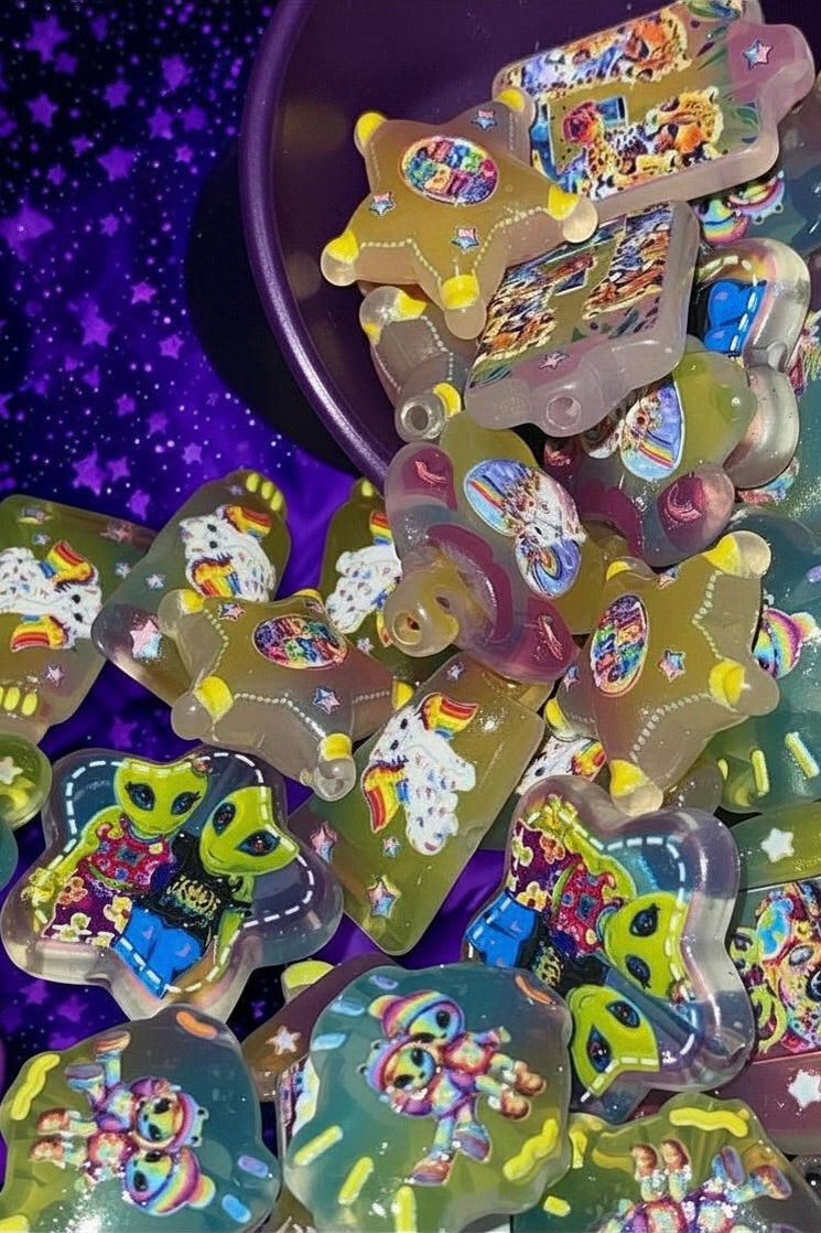 Rainbow jelly fantasy bead charms in purple bowl with stars