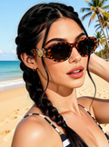The Versailles Frames leopard print on sand flat lay