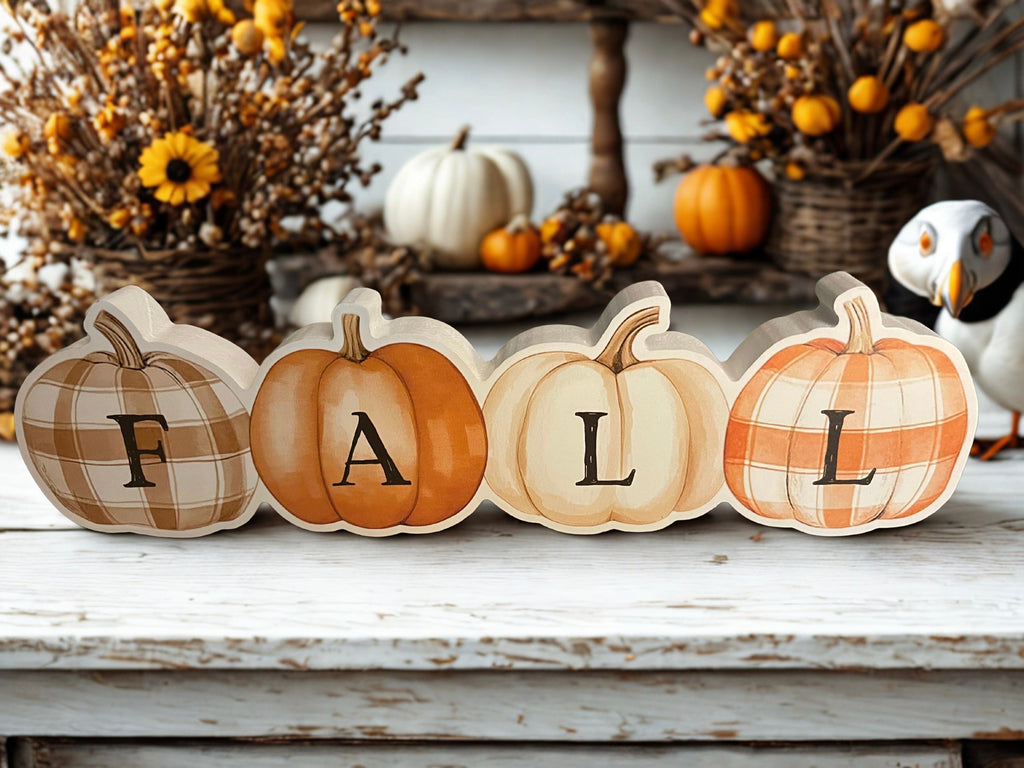 Fall patchwork pumpkins wooden sitter on white bench with fall florals
