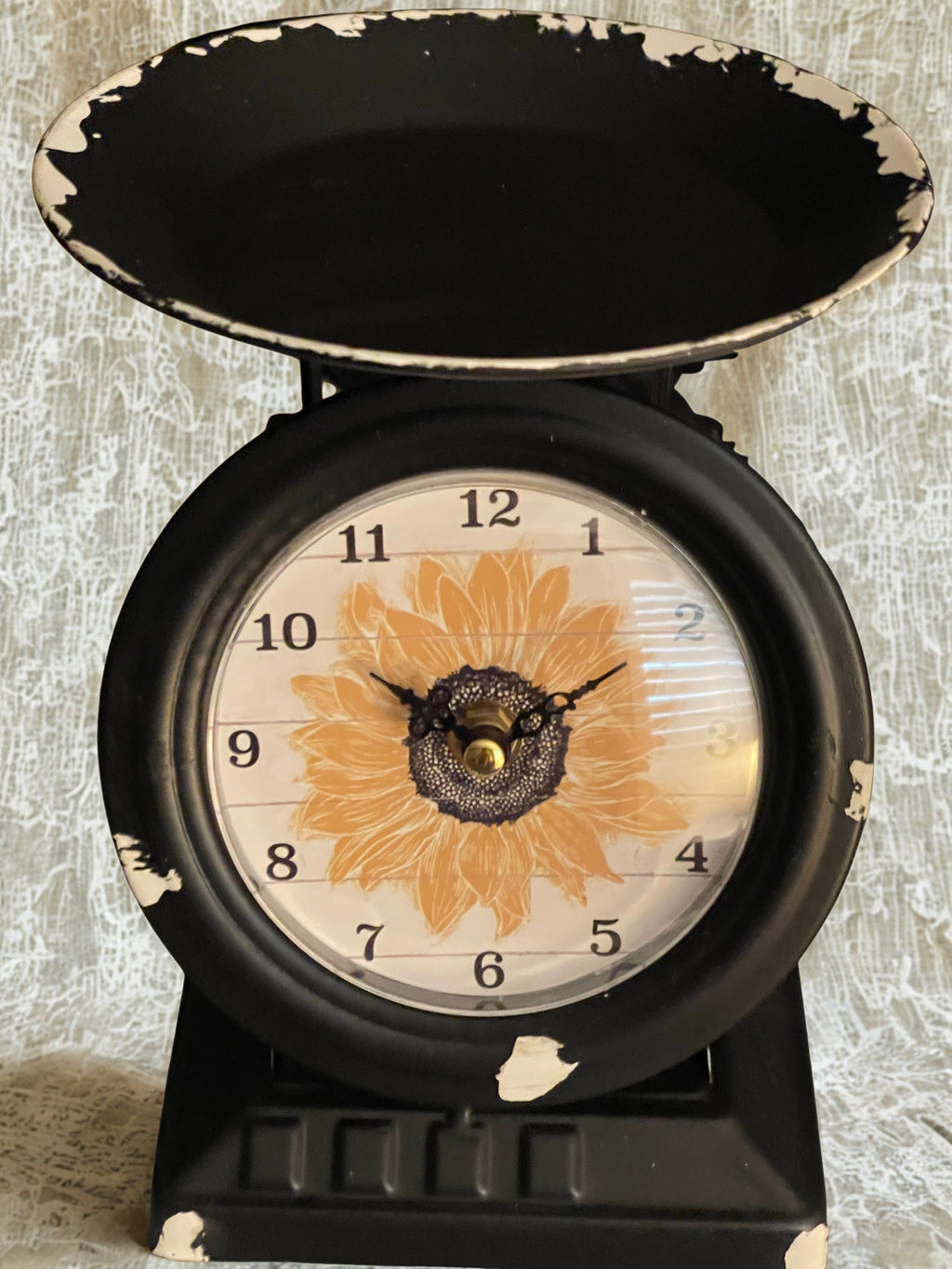 Vintage sunflower scale clock product shot on white background