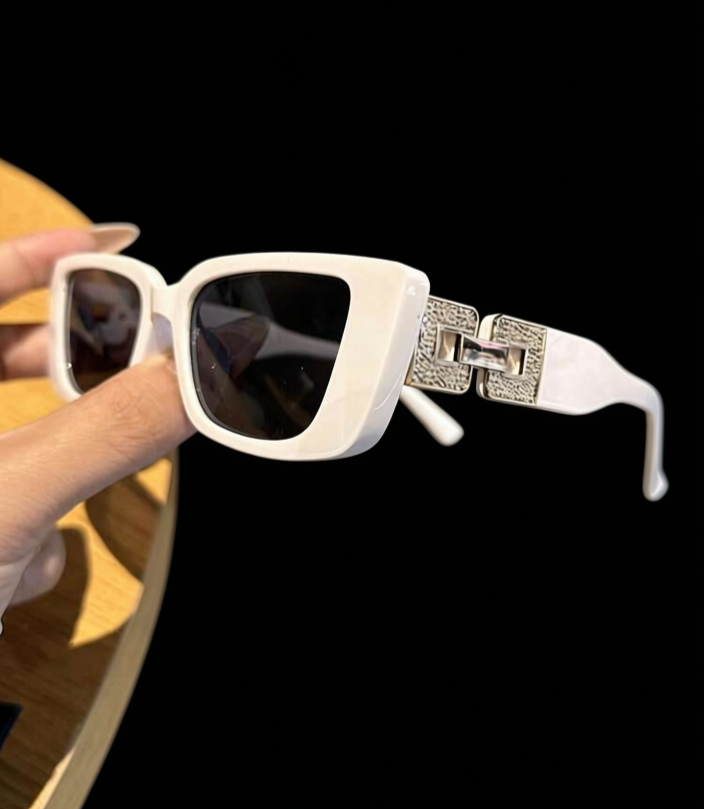 The Prestige Frames black side view showing gold interlocking hardware