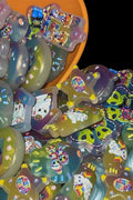 Rainbow jelly fantasy bead charms in orange bowl
