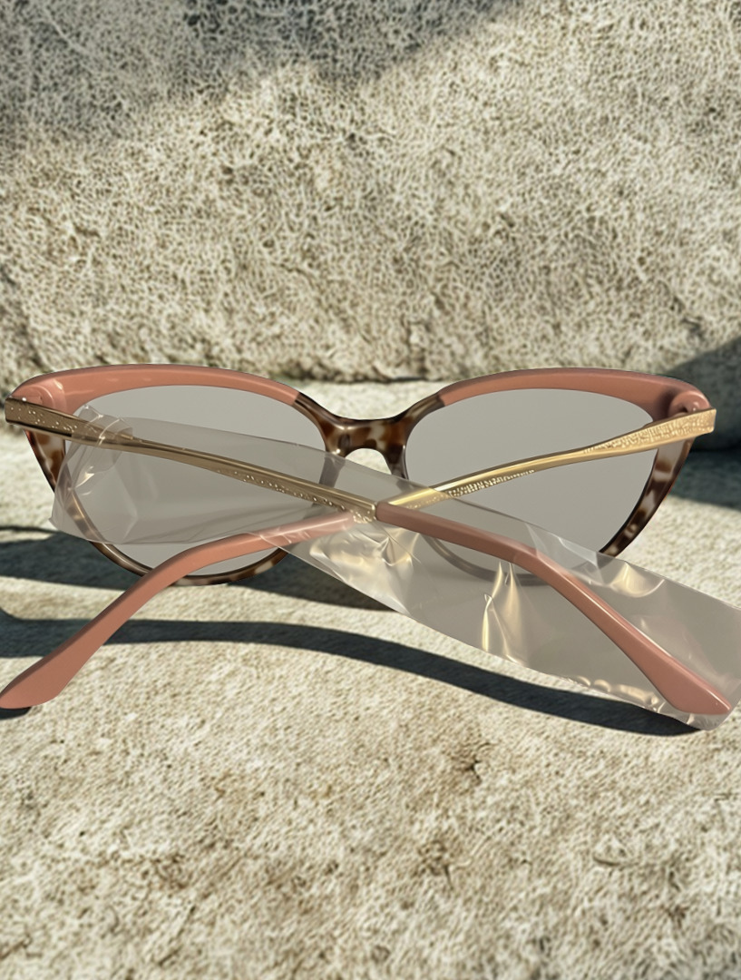 Rosé & Wild Sunglasses back view on stone surface in sunlight