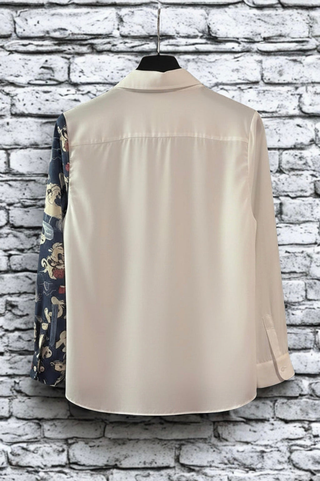 Close-up of floral art print detail on blouse