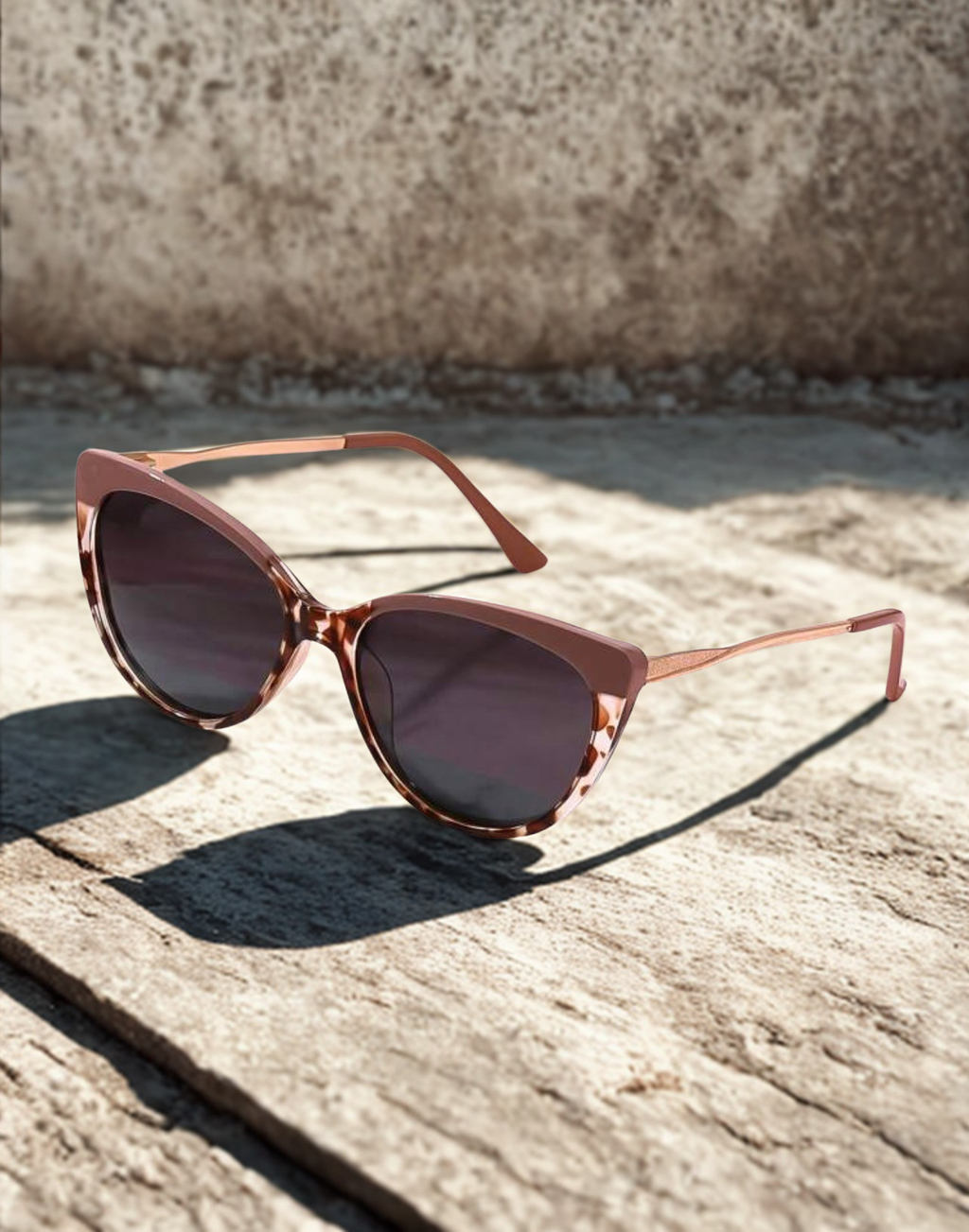 Rosé & Wild Sunglasses on stone surface in natural light