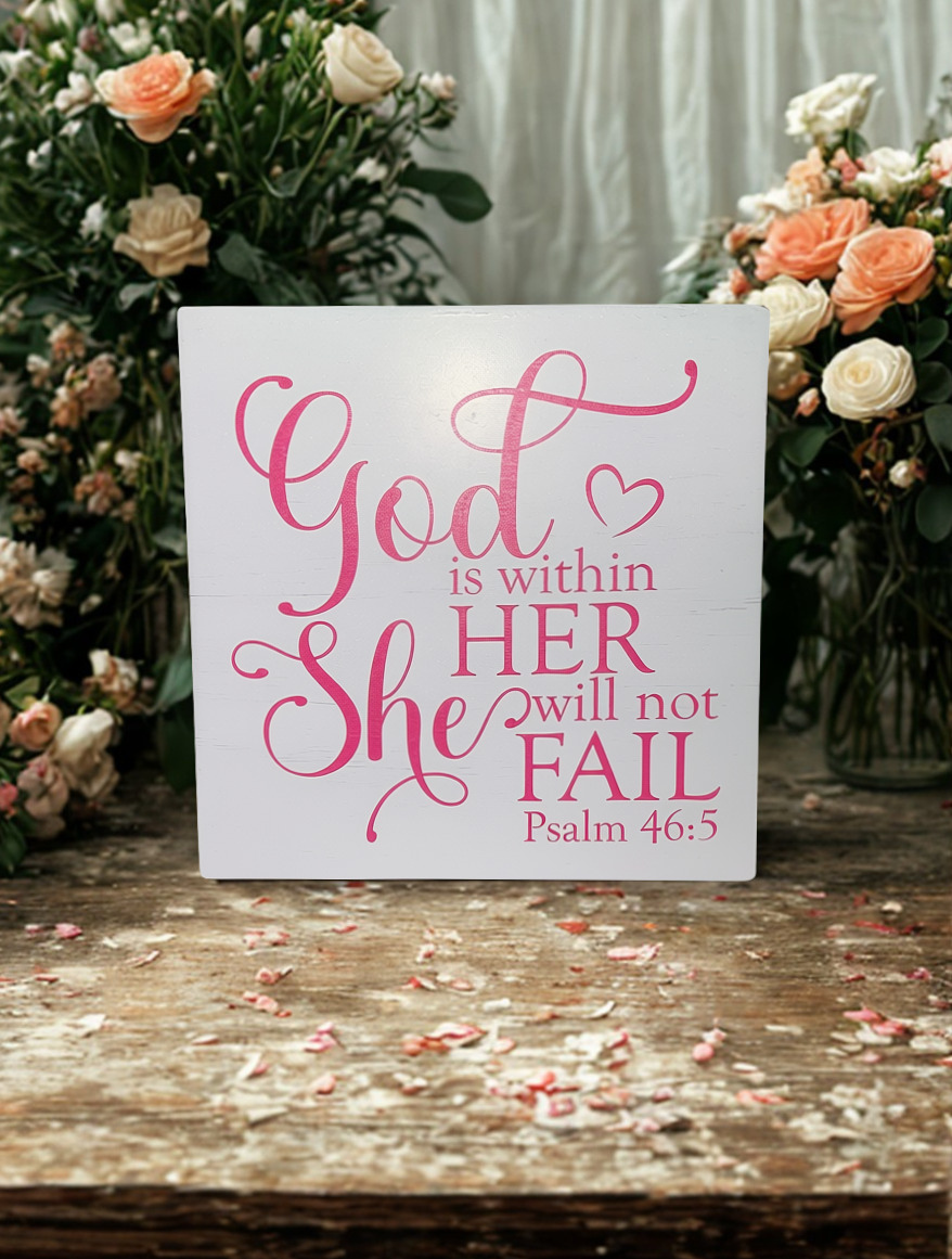 Psalm 46:5 wooden sign surrounded by peach and white roses on rustic table