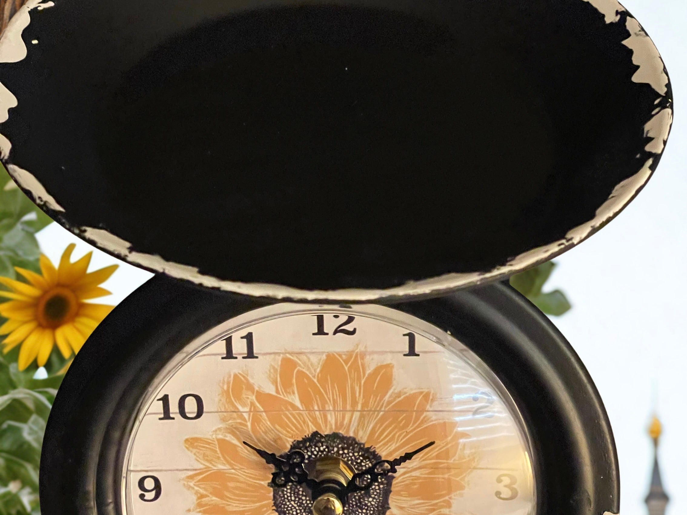 Vintage sunflower scale clock angled view showing platform tray and distressed black finish