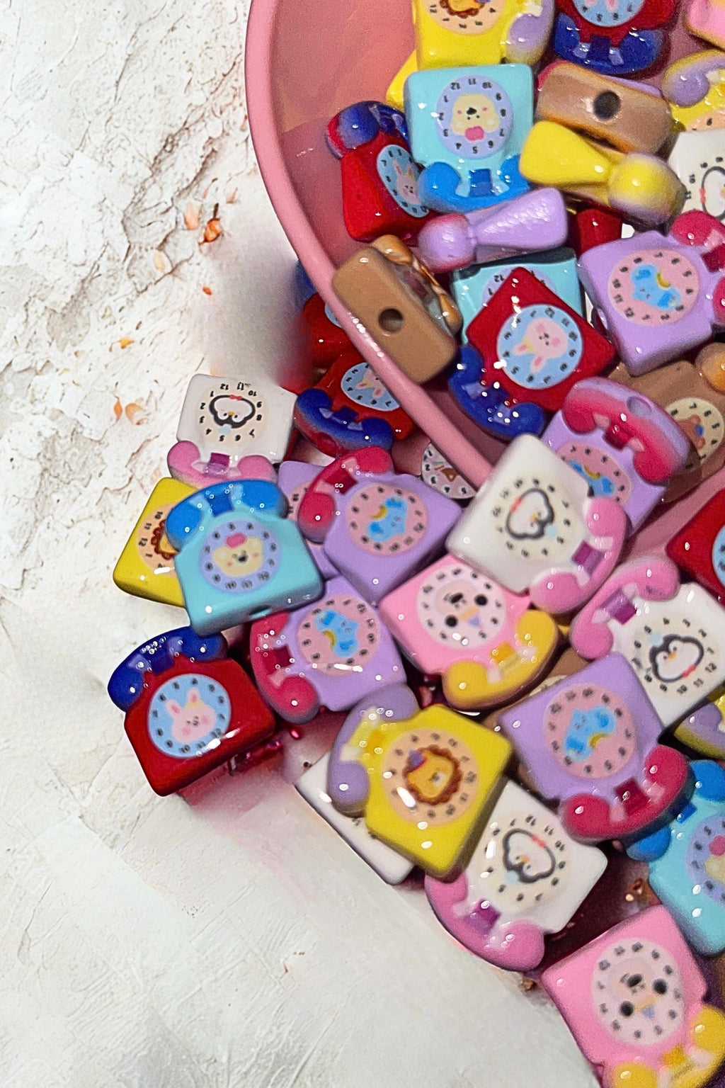 Kawaii rotary phone bead charms in bowl