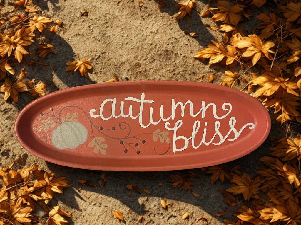 Autumn Bliss oval tray displayed on white mantel with candles and dried orange botanicals