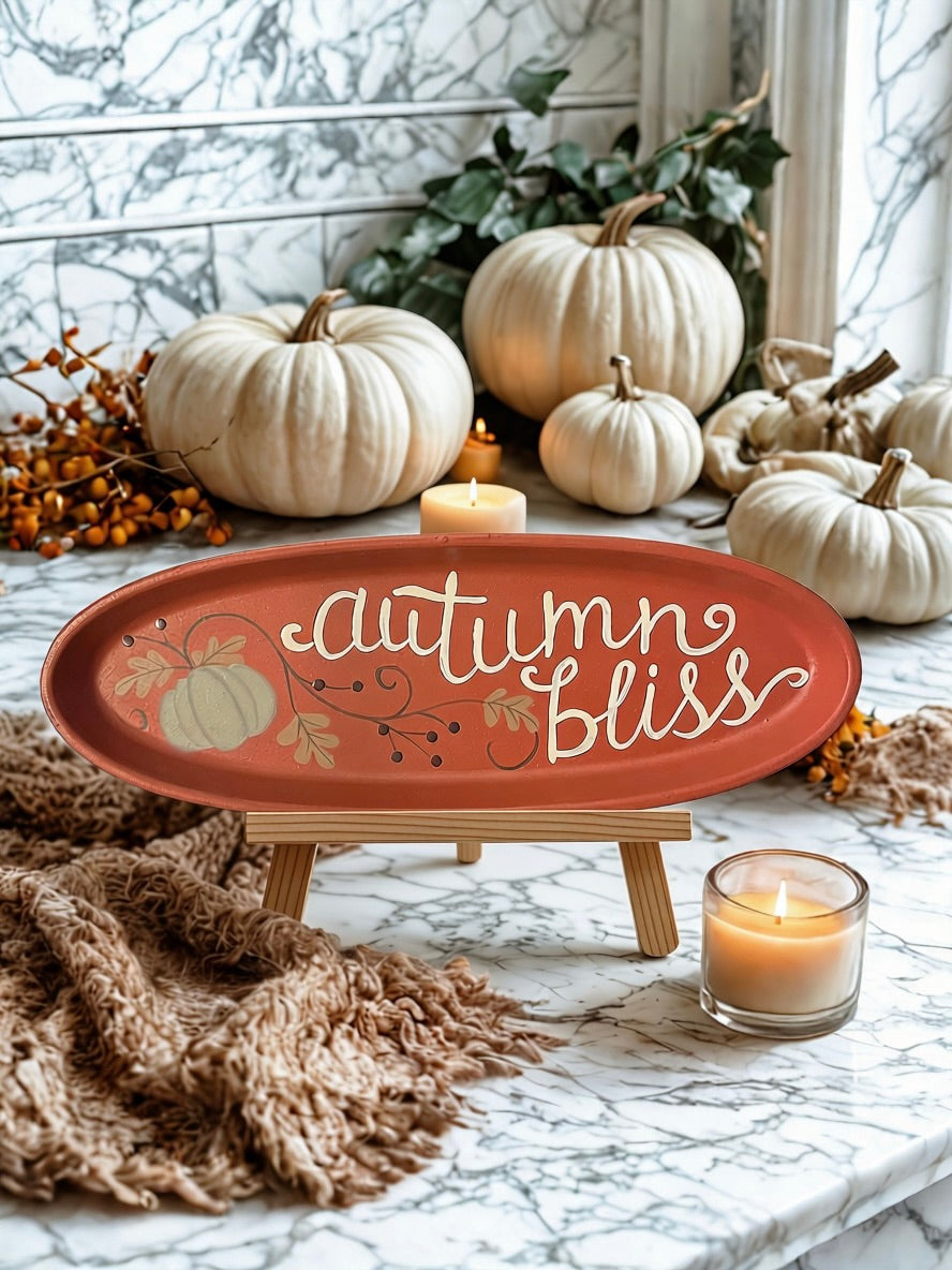 Back of Autumn Bliss oval tray showing Michelle Kildre signature and Hearthside Collection label