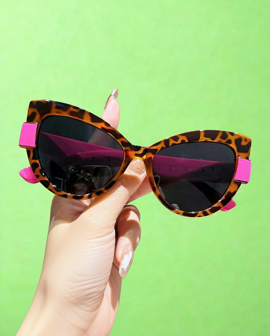 Leopard Kiss Cat Eye Sunglasses held in hand