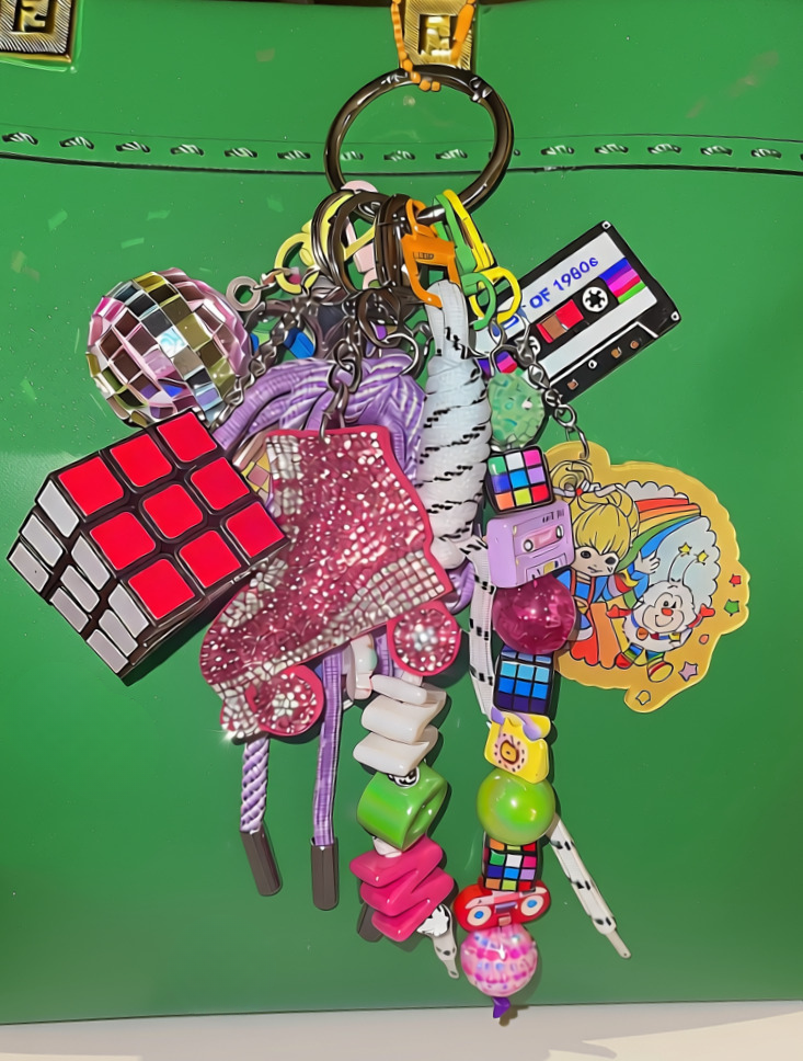 80s bag charm - Pop-Brite variant with Rainbow Girl character and colorful bead strand