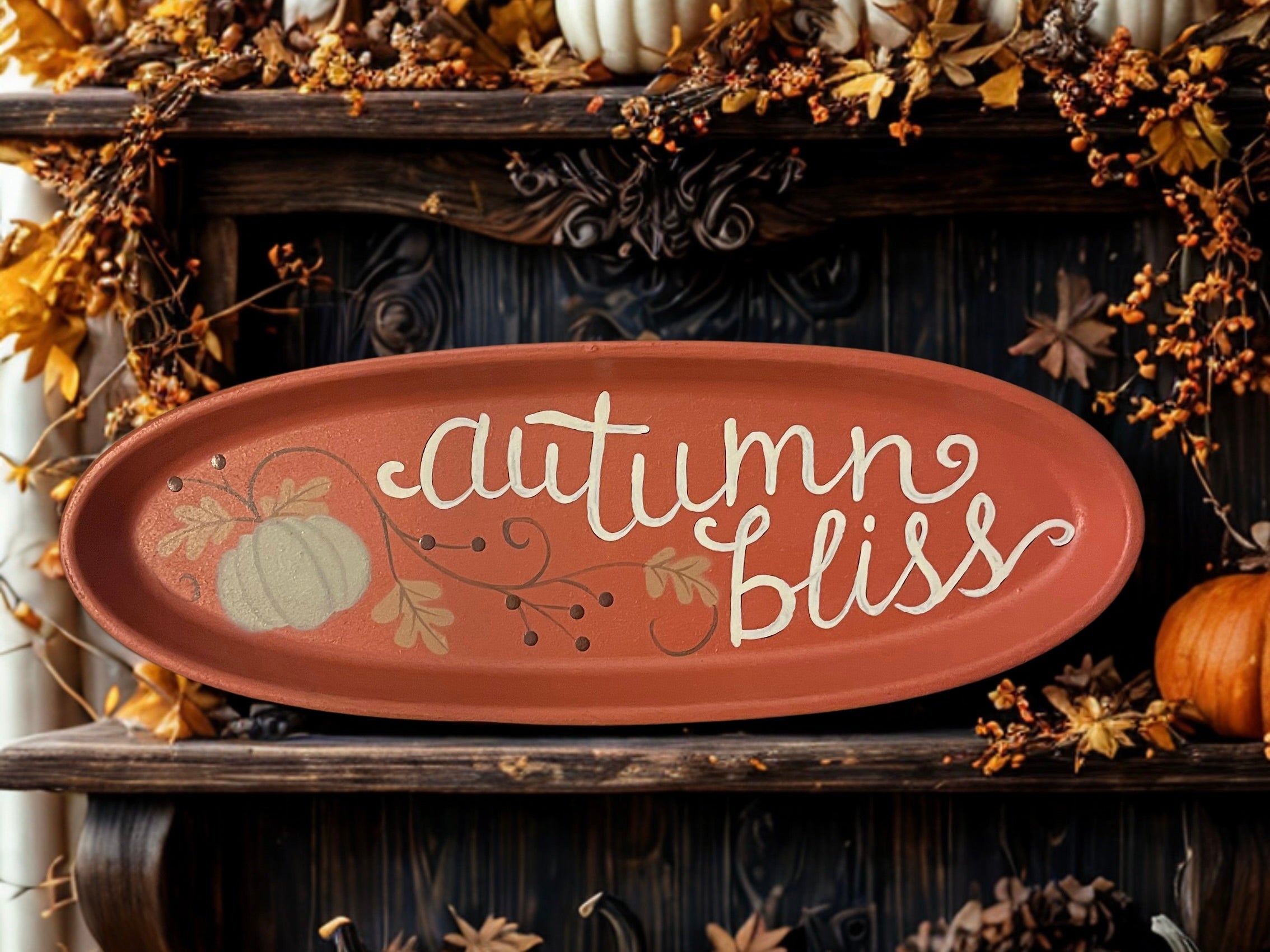 Autumn Bliss oval tray on stand in golden autumn light with fall leaves and pumpkins