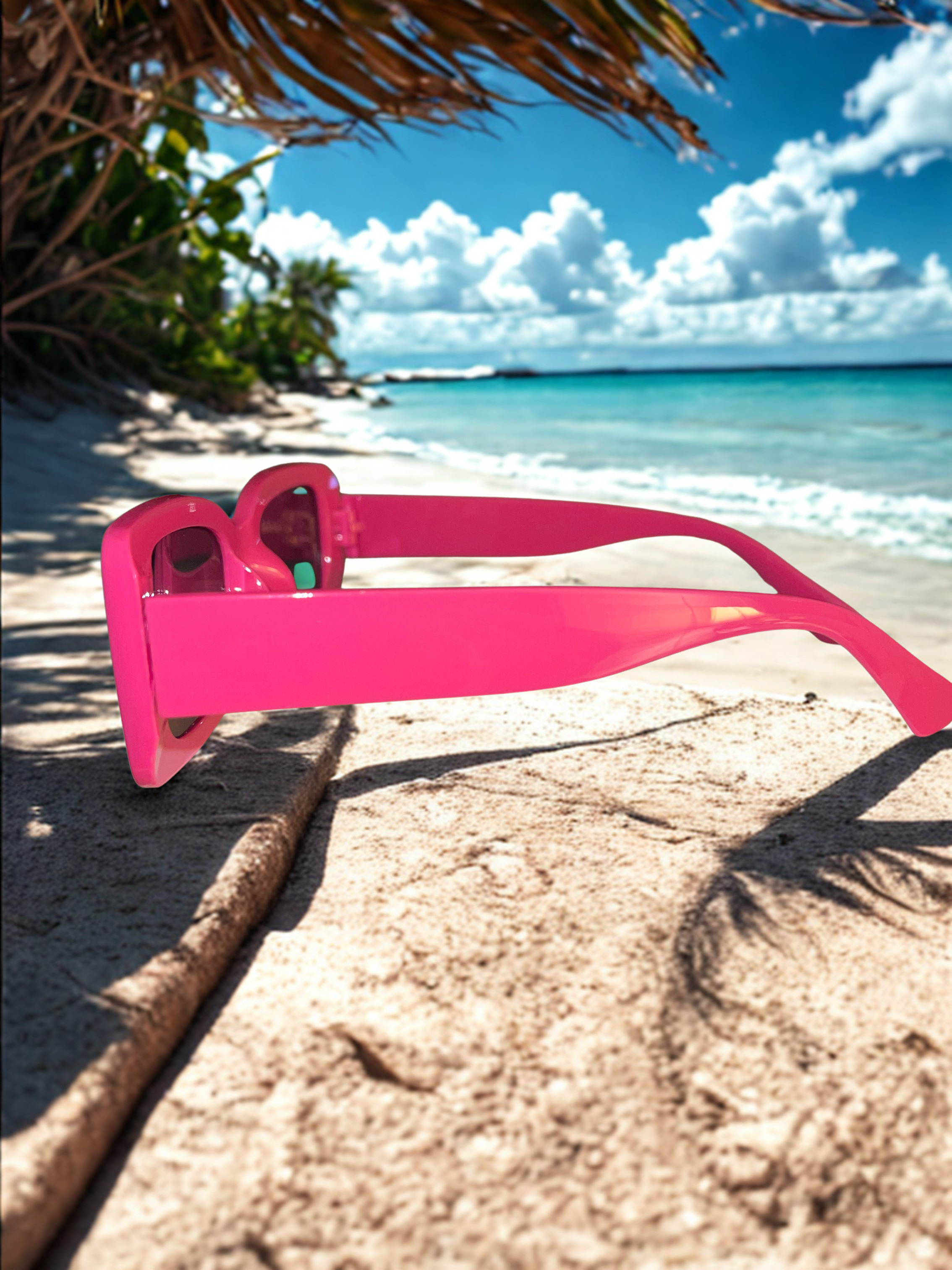 Neon Escape Sunglasses back view on tropical beach