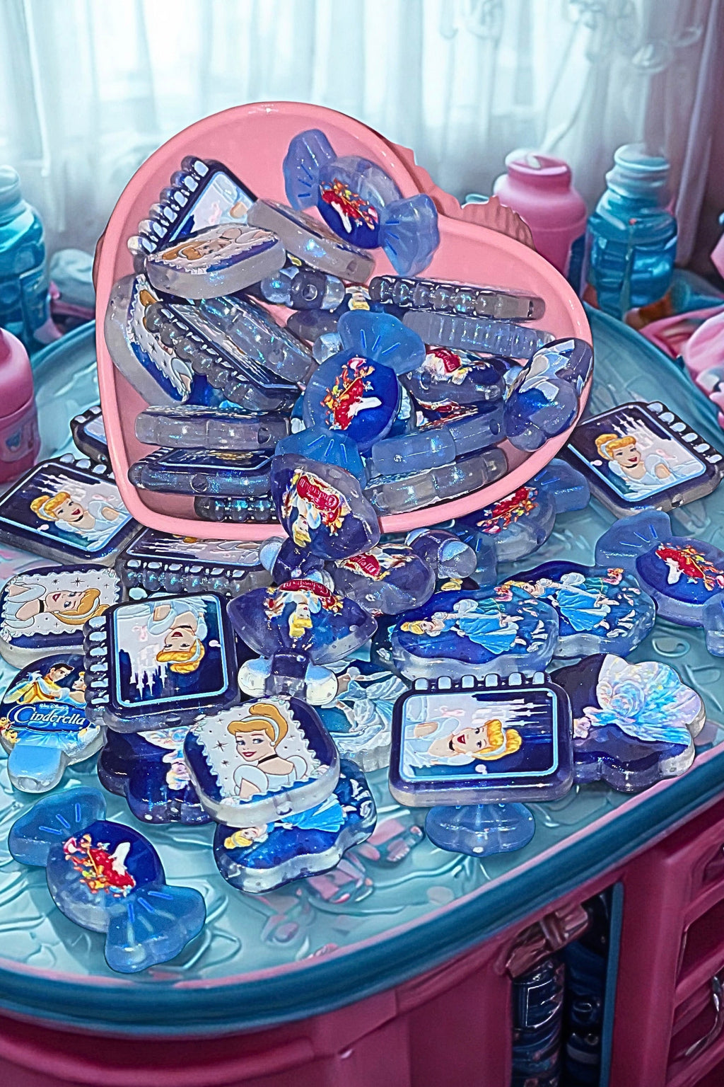Close up of Cinderella blue glitter beads showing princess and castle imagery
