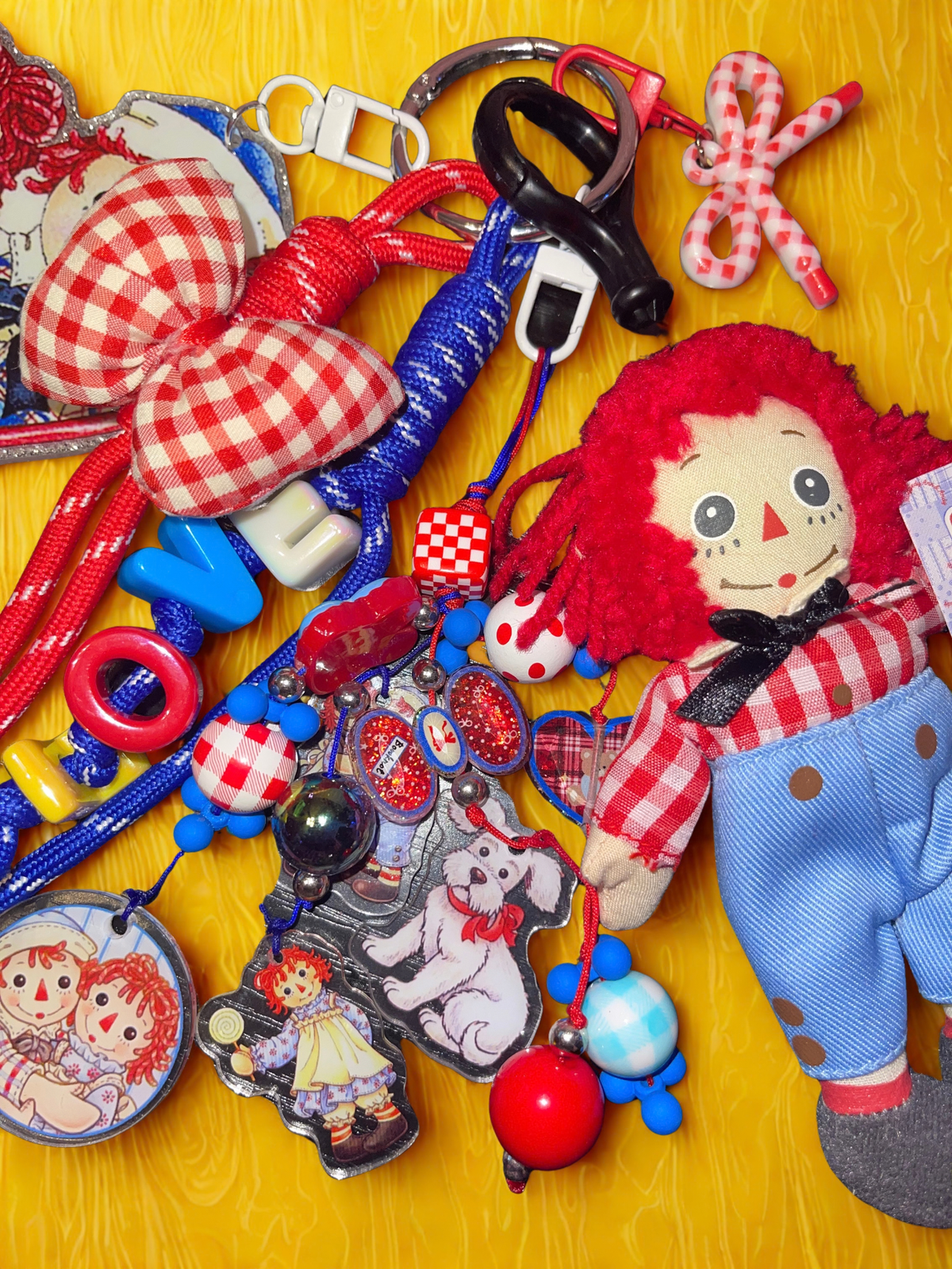 Rag Doll Plush Loaded Bag Charm – Chunky "LOVE" Paracord Keychain with Gingham Accents