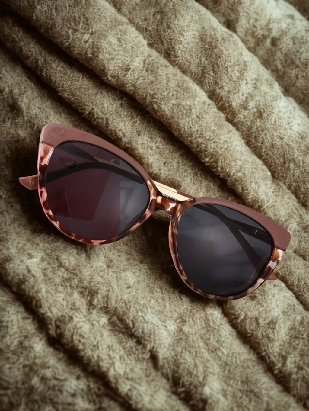 Rosé & Wild Sunglasses on knit fabric texture
