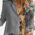 Asymmetric floral art print blouse in cream - worn lifestyle shot detail