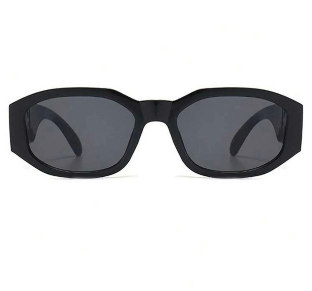 The Versailles Frames black on beach rocks